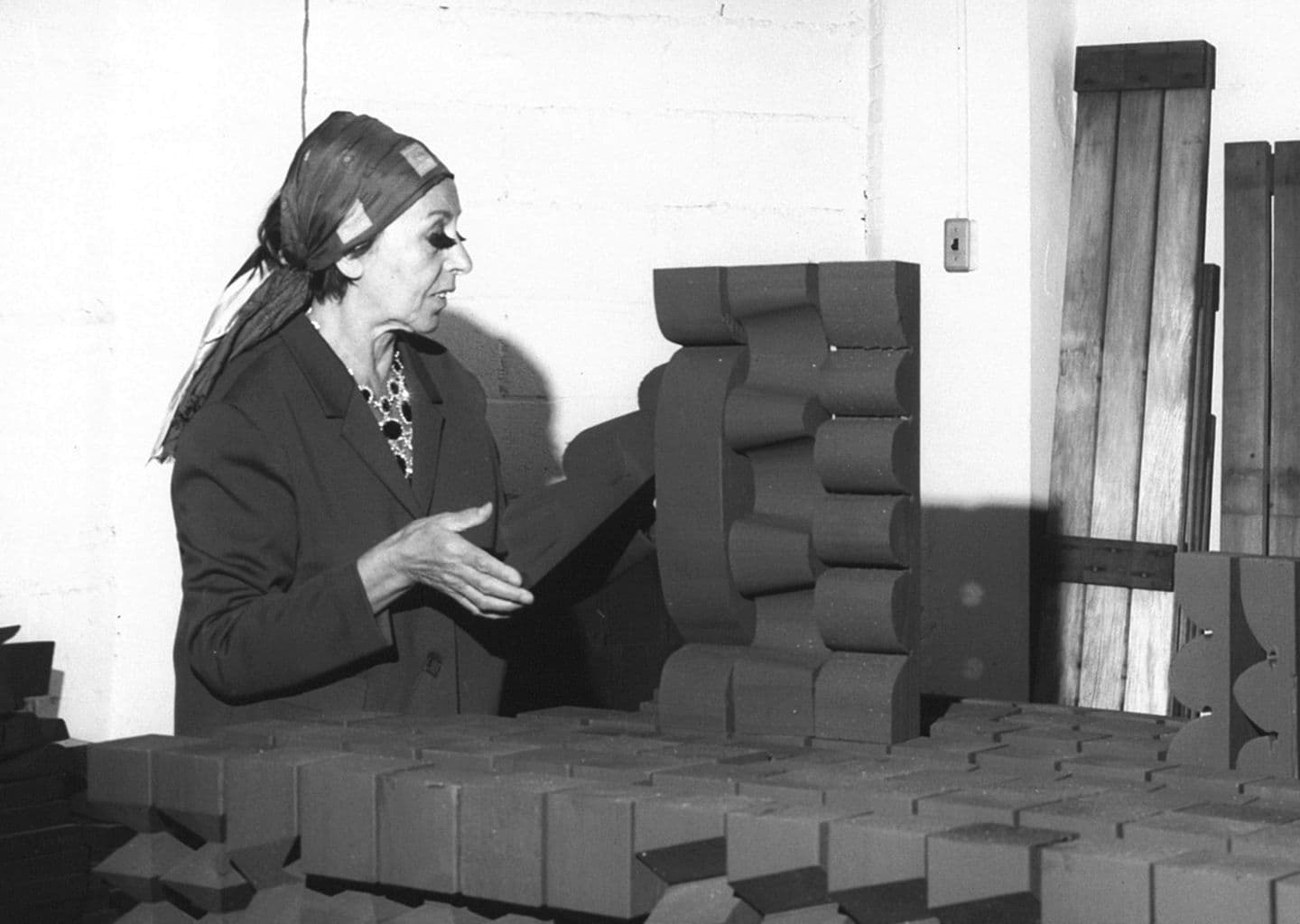 Louise Nevelson in her studio